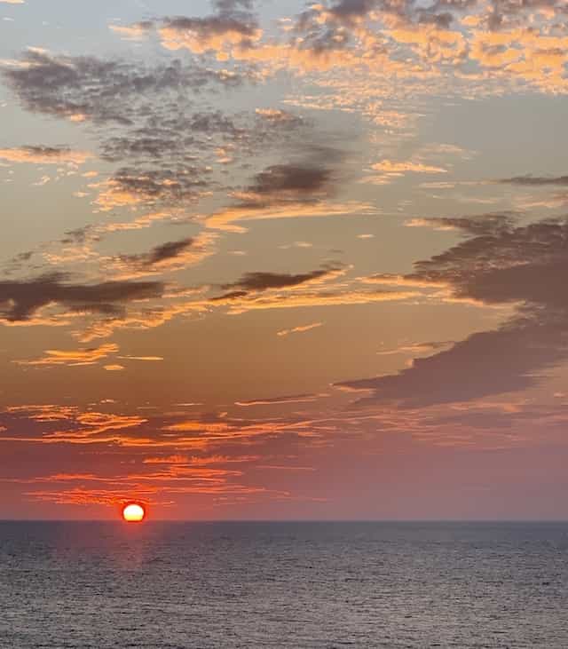 Japan motorcycle tour ninjatours matsunoyama yunohama sunset over ocean