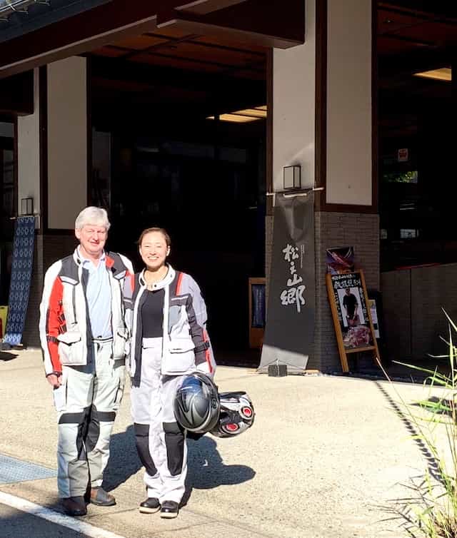 Japan motorcycle tour ninjatours bandai matsunoyama pose in front of store