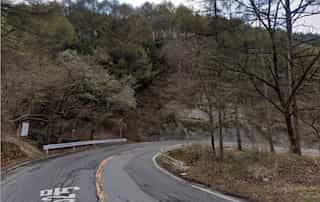 Japan motorcycle tours ninjatours shizuoka sumatakyo onsen nagano road and mountains curve to the right