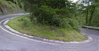 Japan motorcycle tours ninjatours shizuoka sumatakyo onsen nagano road and mountains hairpin turn