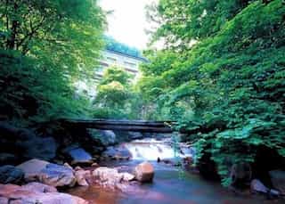 Japan motorcycle tours ninjatours shizuoka sumatakyo onsen nagano road and mountains with river 