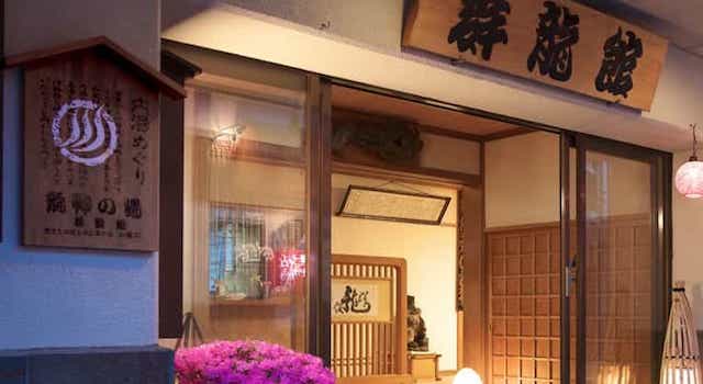 Japan motorcycle tour ninjatours ryokan entrance traditional japanese inn