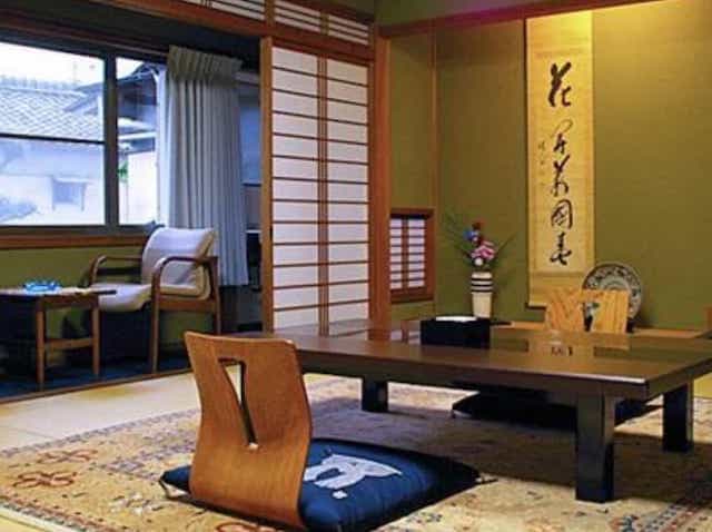 Japan motorcycle tours ninjatours kyoto maizuru ryokan traditional bedroom