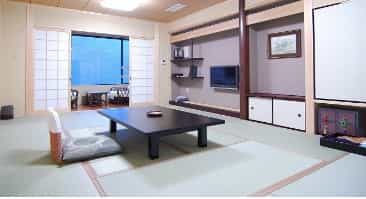 Japan motorcycle tour ninjatours ryokan Shikoku bedroom