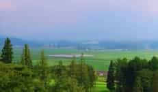 Japan motorcycle tour ninjatours kyushu aso Yamanari Highway and grassy plains