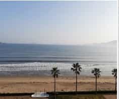 Japan motorcycle tours ninjatours karatsu ryokan beach view