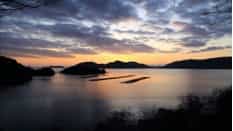 Japan motorcycle tours ninjatours Kasadoshima mountain background with beautiful coastal view
