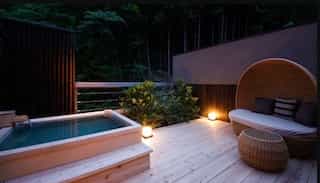 Japan motorcycle tours ninjatours Kagawa bedroom deluxe accommodations onsen ryokan