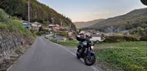 Japan motorcycle tour ninjatours tokyo kiso intense ride roadside by farm