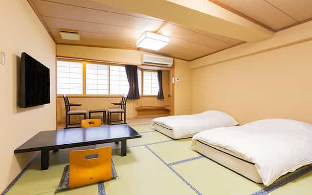 Japan motorcycle tour ninjatours Mt tazawa ryokan traditional bedroom
